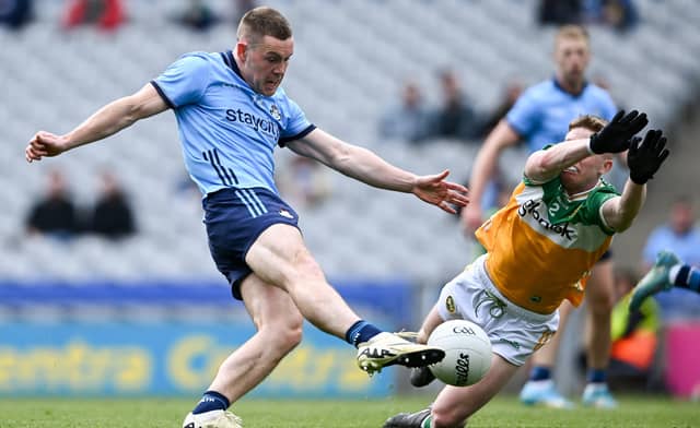Lee Pearson can't stop Con O'Callaghan scoring Dublin's first goal.