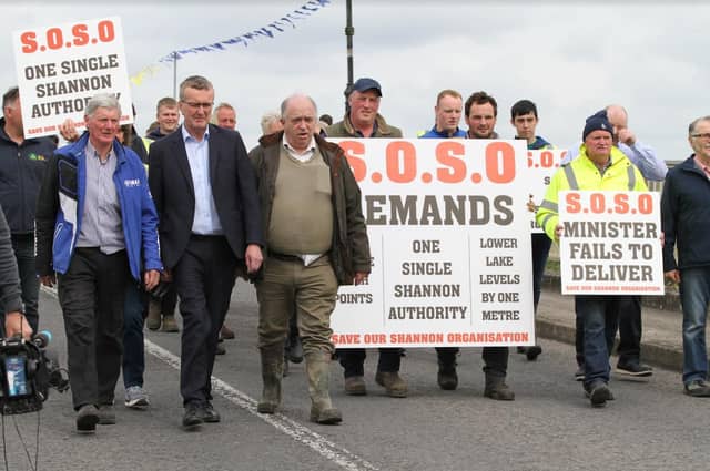 Some of the 200 protesters on Banagher Bridge including, on the far left, Michael Silke of SOSO and Tim Cullinan national Chairperson of the IFA.