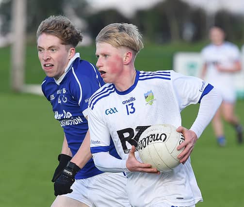 DD Reilly Roche in full flight as he takes on Ballycommon,s Chulainn Boland in the AIB Club Championship game in Darver.
