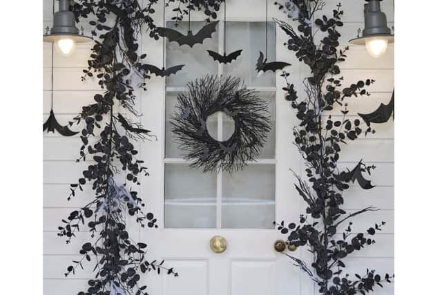 1. Black Twig Halloween Wreath with Bats, £22.49 (was £29.99), Halloween Garland Foliage Door Kit with Webbing &amp; Hanging Bats, £52.49 (was £69.99), Ginger Ray.