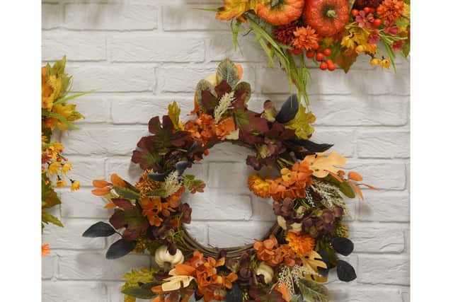 1. Autumn Harvest Floral Wreath – Orange, £27.99, The Range