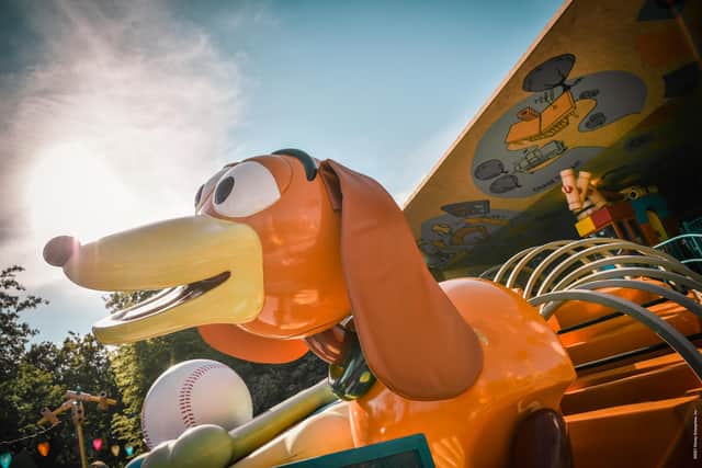 In stark contrast, guests of any age and height can enjoy the gently looping undulations of Slinky Dog Zigzag Spin.