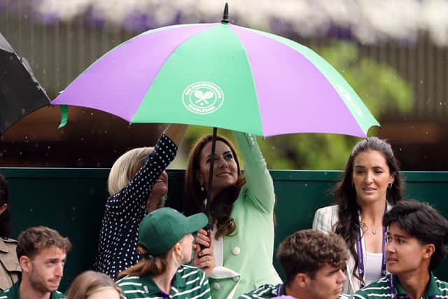 The princess also had a rainy visit to Wimbledon on the tournament’s second day, when she was forced to shelter under an umbrella on Court 18, where she was watching British number one Katie Boulter.