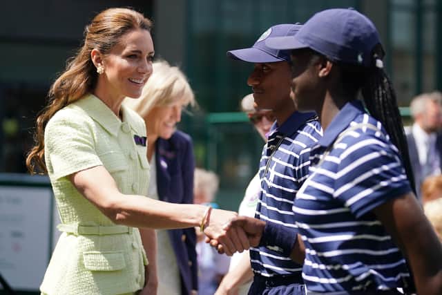 Kate arrived over an hour before the match began and chatted to Wimbledon staff.