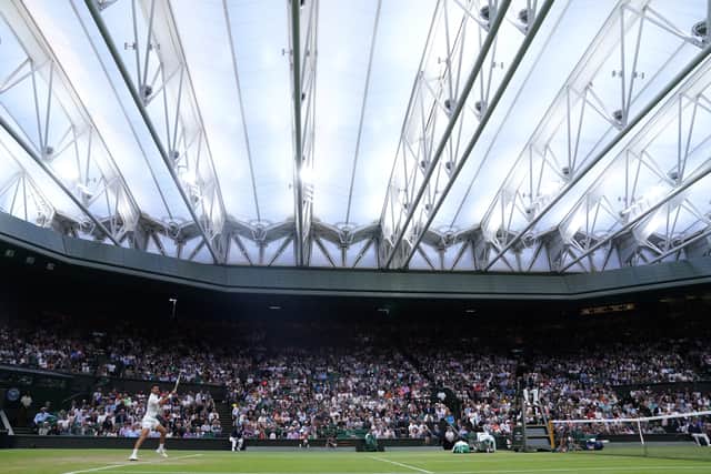Covers were pulled across the court at 4.35pm and an announcement informed spectators: “Ladies and gentlemen play is suspended and a further announcement will be made shortly.”