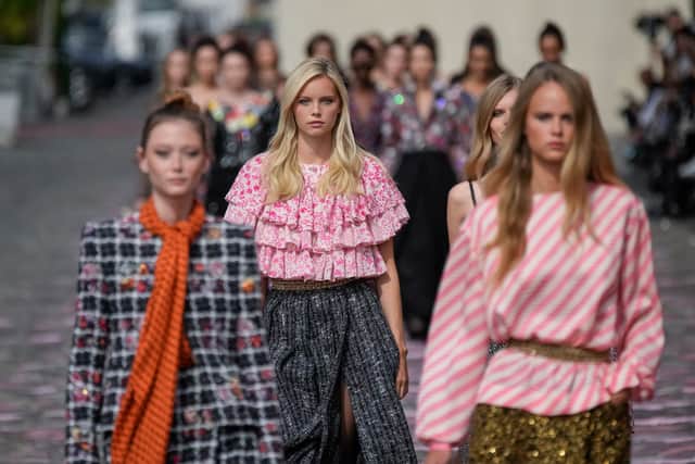 As well as form-fitting tailoring, floaty blouses and floor-sweeping coats offered looser, more youthful silhouettes.
