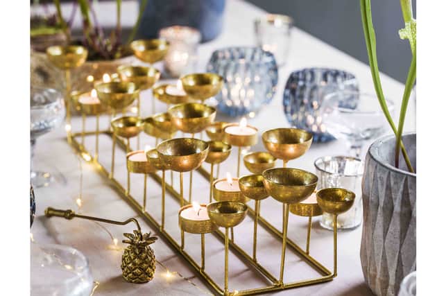 2. Gold Multi Tea Light Holder, £45, Graham &amp; Green