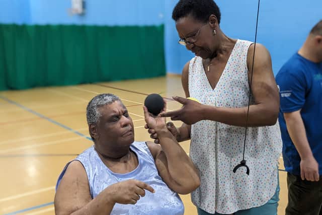 Lin Wallace, who has cerebral palsy, epilepsy and is blind, is a big tennis fan and has taken up sensory tennis, which uses special equipment, including balls that make a sound when they are hit.