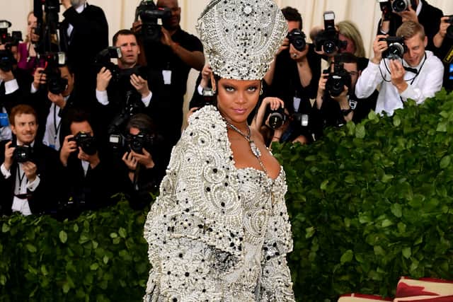 Rihanna was “very, very generous” to loan five internet-breaking looks, including the papal-inspired gown and hat she wore to the Catholic-themed 2018 Met Gala and the crystal-embellished blush pink gown worn to the 2014 CFDA Awards.