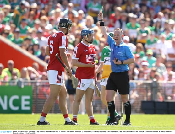 Chris Mooney showing a yellow card to Darragh O'Sullivan