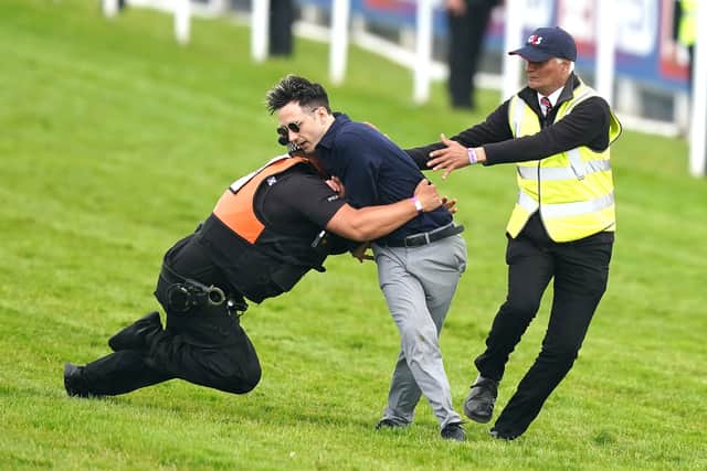 Harrington thanked the police and security teams for their speedy response, but criticised the behaviour of the protester involved.