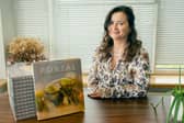 Tina Claffey with her book, Portal.