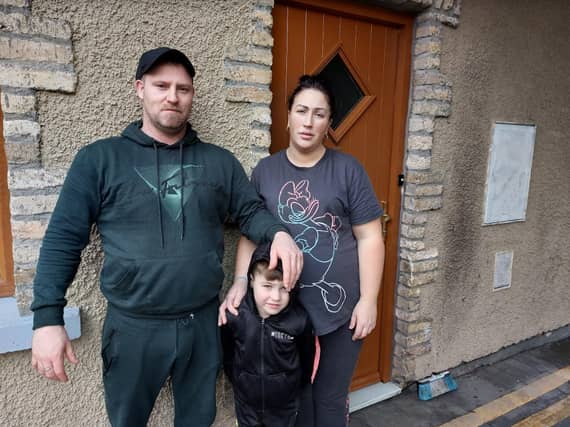 Pictured outside their emergency accommodation on Main Street Birr were l. to r. Patrick, Joey and Michelle O'Brien
