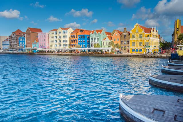 Human history on this constituent country within the Kingdom of the Netherlands can be traced back in picturesque world heritage site, Willemstad. Here I find striking coral stone buildings in European neoclassical style adorned in vibrant Caribbean colours. A governor once ordered all homes to be painted in bright colours because the white buildings were giving him a headache, our guide Maja Atalita Vervuurt says. It transpired he owned the island’s biggest paint company, but the colourful houses stuck and these days walls of the city come with a lot of beautiful street art too.