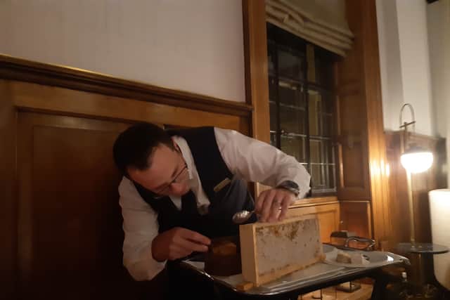 Finally, a little welcome table theatre when our waiter Antonios slices pieces of honeycomb direct from the frame to add to our cheese plate.