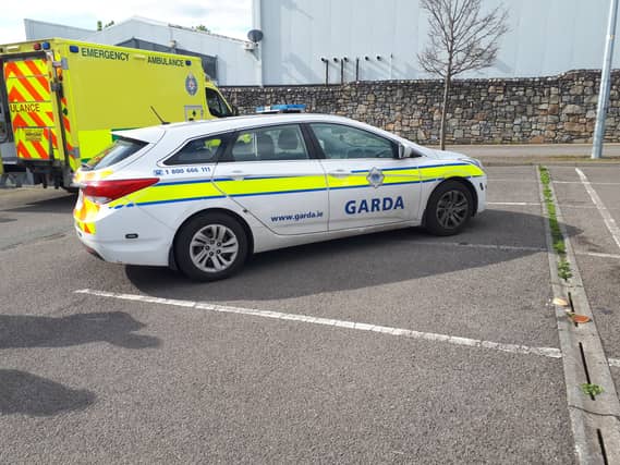 A garda car and ambulance at the scene of this afternoon's incident