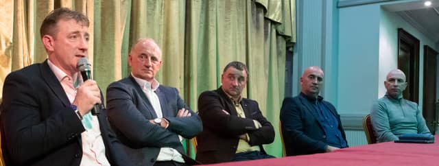 Brian Whelahan, watched by Joe, Billy and Johnny Dooley and DJ Carey at the launch of the Dooley Family Memoir. Picture: Ger Rogers