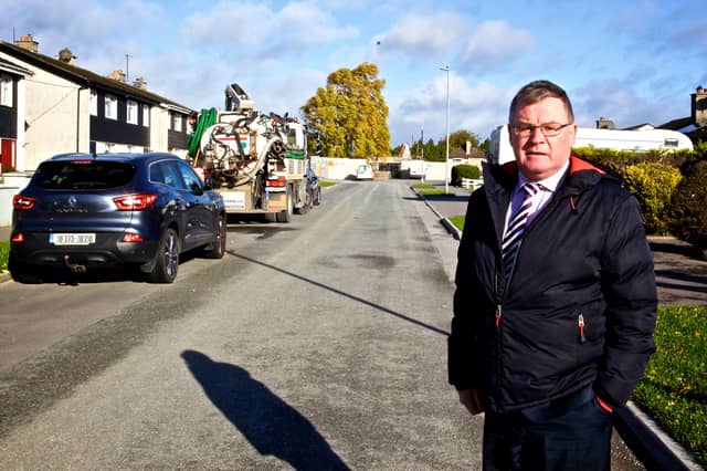 Cllr Sean O' Brien standing in the narrow cul de sac in Arden View which will be used as the main entrance and exit for a new housing estate