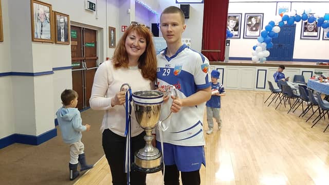 Vlad Biriuk, a member of the Tullamore minor football panel, pictured with his mother Inna after the county final