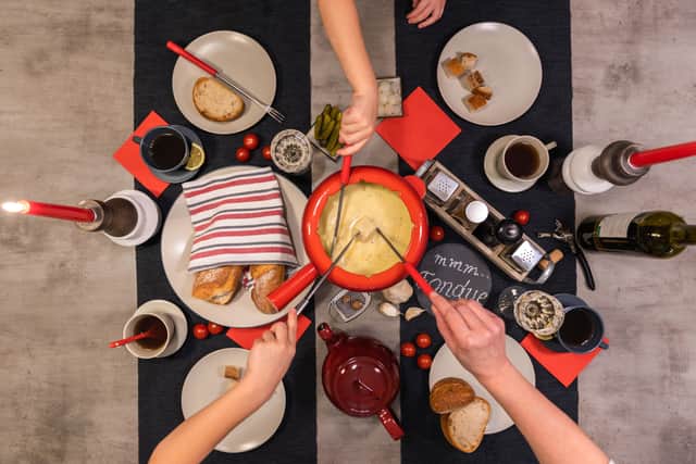 5. Host a bring-a-bottle fondue party