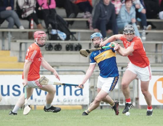 Man of the match Ciaran Cleary and Conor Hernon battling for the ball