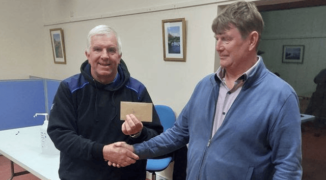 Patrick Kenny - from Shannon Harbour Community Development Committee presenting Ollie Doyle with first prize in the annual classic match.