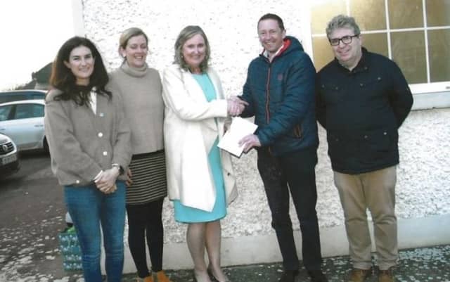 Presentation from Drumcullen GAA and Camogie Club to Maria Davis (l. to r.): Michelle Egan, Sinéad Dooley, Mrs Maria Davis, Peter Lyons, Dermot Horan.