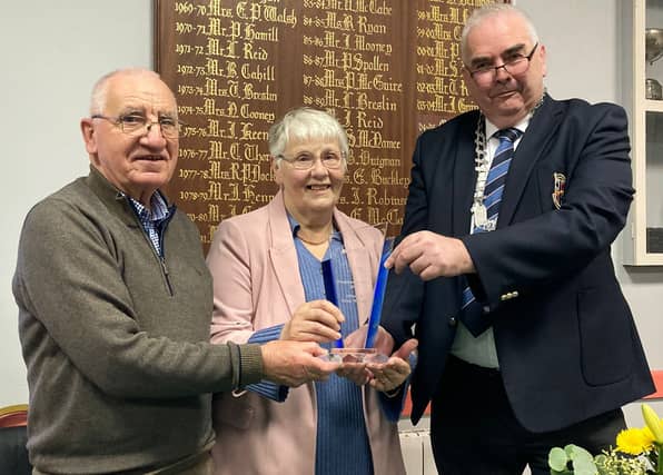 Ultan and Eileen McCabe presented with their award by national president of the CBAI Pat O'Mahony.