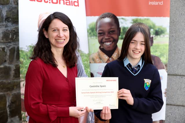 Caoimhe Spain from CNC Kilcormac receiving her prize as All-Ireland finalist in the Action Aid speech writing competition from Karol Balfe CEO Action Aid Ireland.