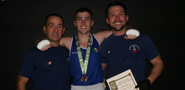 Paul Loonam with his father Paul (left) and uncle Kevin Loonam (right) after winning the national U-22 boxing title last weekend.
