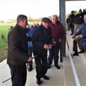 Mick Hogan (President) and Donie Moloney (Captain 1971 All-Ireland winning team), with Roscrea GAA Chairman Mark McLoughlin (on left), cutting the tape at the new stand at St Cronan's Park, Roscrea.