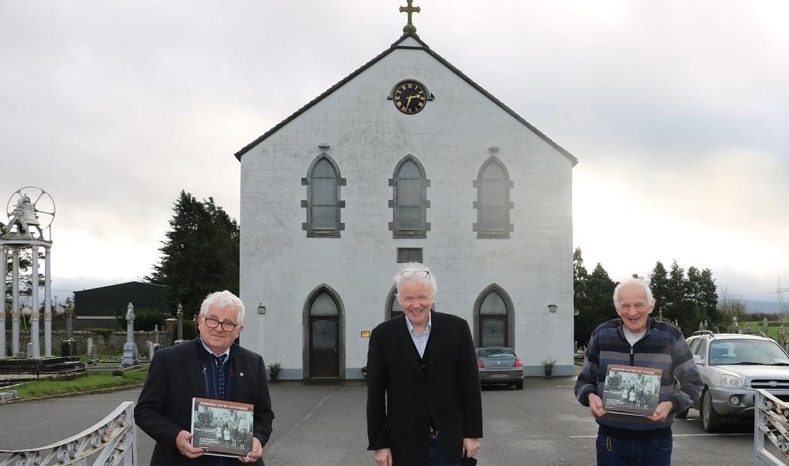 Johnny Butterfield, authro Michael Byrne and Johnny Mann pictured with copies of the book at the church in Mopuntbolus