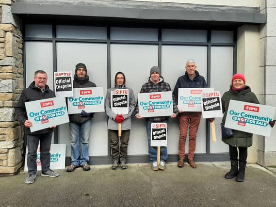 At the Tullamore Job Club strike on Monday: from left, Cllr Sean O'Brien, Enda Finlay, Maria Maguire, Caleb Finlay, Peter Glynn, SIPTU, Majella Finlay, Tullamore Job Club leader