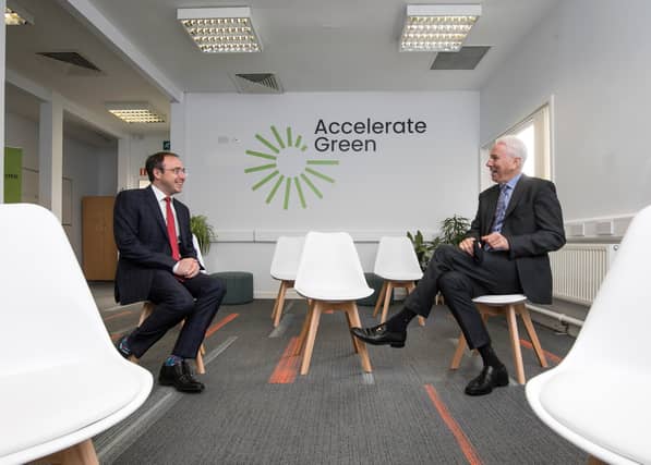 Tom Donnellan (right), chief executive of Bord na Mona, pictured with Minister Robert Troy at the announcement of the company's new programme to boost enterprise
