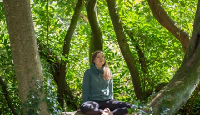 Alicja Pilarska practising the Japanese art of Forest Bathing in the Victorian Fernery in Birr Castle.