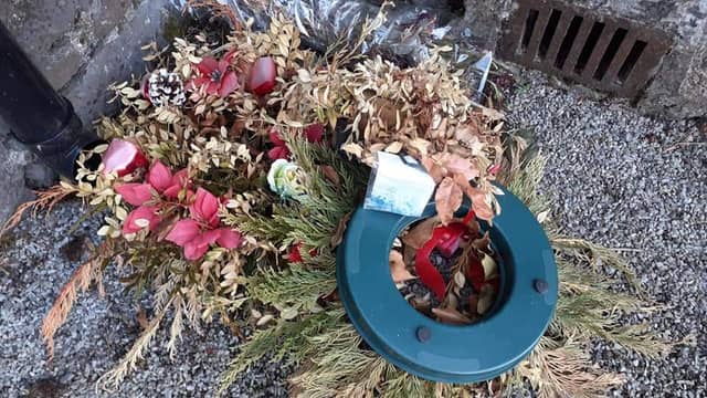 Pictured is rubbish left behind in Clonoghill cemetery recently