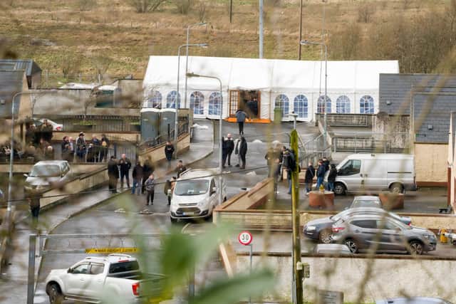 Following the funeral in St Mary's Church and burial in St Mary's Cemetery, which was attended by over 300 people, Gardai attempted to prevent the mourners from returning to a marquee that had been erected the previous day.