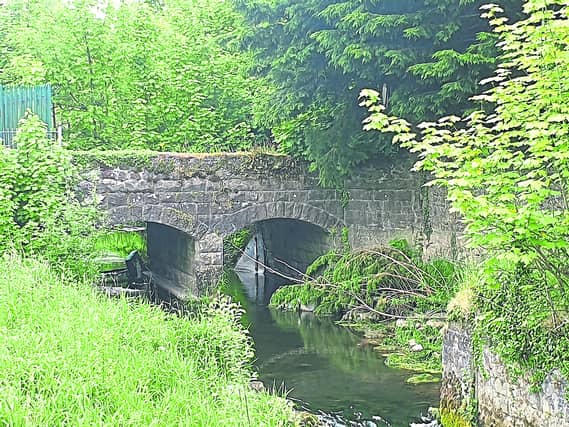 A bridge across the Tullamore river at the rear of Main Street