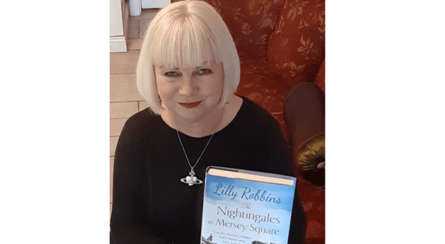 Geraldine O'Neil with a copy of her latest novel