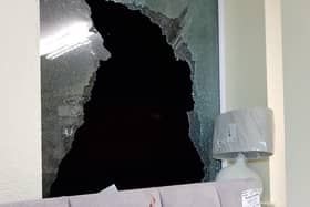 The bloody mark left by a burglar near the smashed window of the business premises in Portarlington