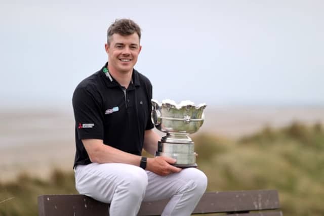 Stuart Grehan celebrates winning the 2025 Flogas Irish Men’s Amateur Open Championship at Seapoint Golf Club