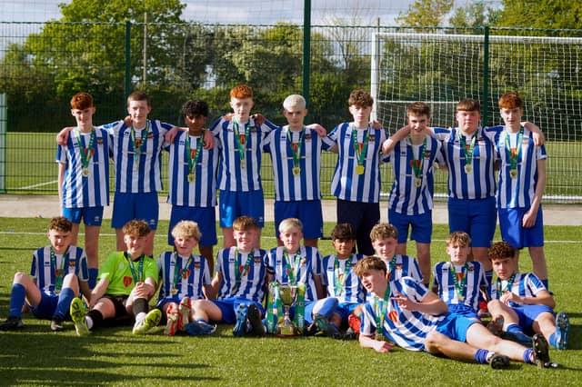 Tullamore Town's winning team following the trophy presentation. Photo: Caomhán ó hAirmhí
