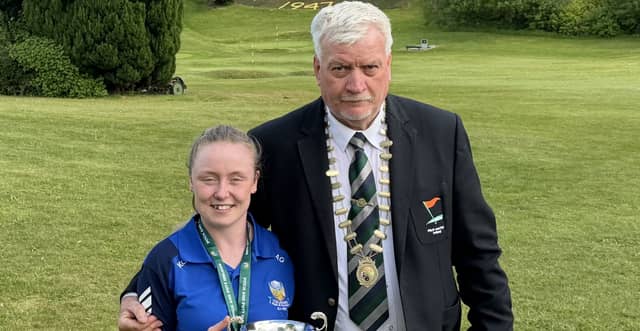 Davy Reddin, president Pitch and Putt Ireland, with Amy Galvin.