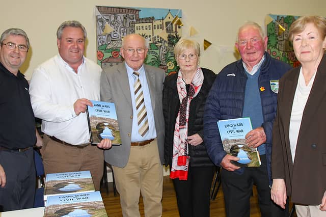 Author Padraig Heavin (middle) pictured with family members during the launch of his latest book “Land Wars to Civil War”. From left, sons Fergal and David, his wife Mary, his brother Michéal and his sister Bernadette.