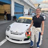 Roscrea racer Nicole with the 450bhp Porsche in the Estoril pitlane after a highly productive test day