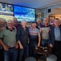 Jimmy, centre with cap, celebrates his 74th birthday with friends in Tullamore. Pic: Rory Fox 
