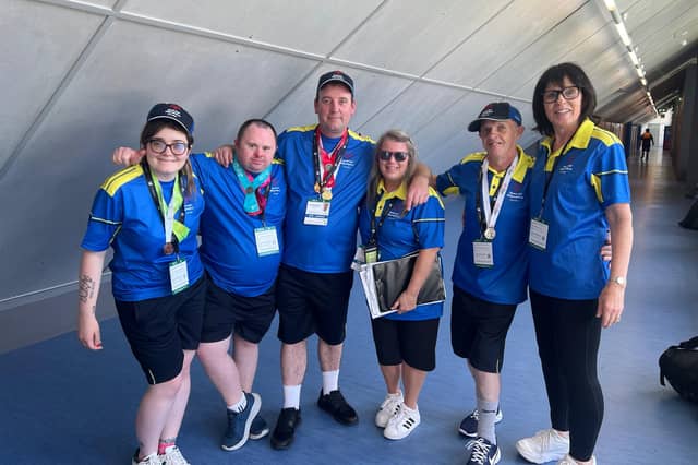 Picture shows Nikita, Mark, Christopher, Shauna (coach), Tony and Patsy (chaperone).
