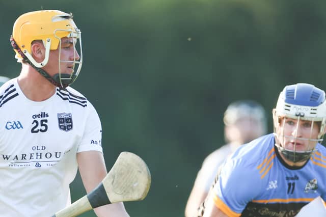 Conor Doyle gets away from Eoin Dunne