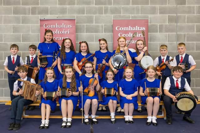 U-12 Grupa Ceoil - 2nd place in Leinster. Front Row (l. to r.): James McConville, Meadbh Connolly, Katie Bennett, Níadh Dooley, Lara Hollywood, Molly Kenny, Sorcha Ryan Hoctor, M.J. Carroll. Back Row: Wayne Harte, Fionnán O’Brien, Mia Ryan, Erin Reddan, Sarah Gath, Lucy Richardson, Lucy Byrne, Róisín Hennessy, Rory Kelly & Cian Kelly.
