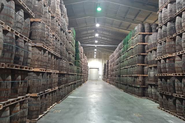 Whiskey maturing in barrels at Tullamore DEW